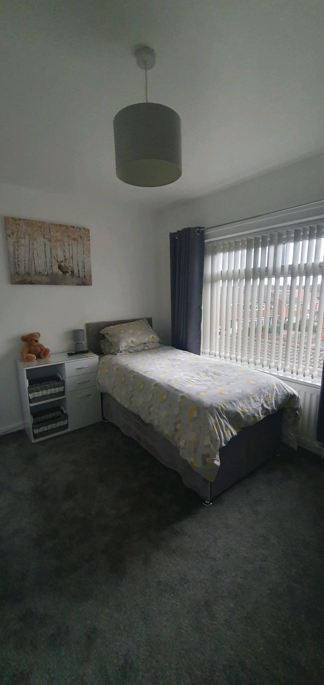 Large furnished room. Bathroom next to the room.  Main Photo